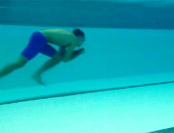 New York Lifeguard Shatters Underwater Walking Record