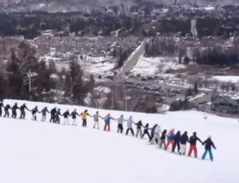 30 Skiers, 1 Backflip: Say Goodbye To Winter With This World Record