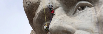 Rangers Rappel Mount Rushmore in National Parks Epic Challenge